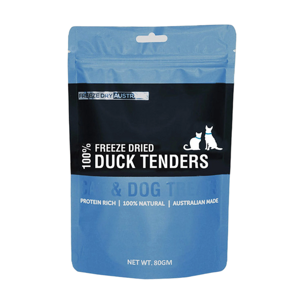 A blue packaging bag labeled 100% Freeze Dried Duck Tenders prominently features a graphic of a dog and cat. The bag highlights its protein-rich, all-natural ingredients and indicates it is Australian made, weighing 80 grams.