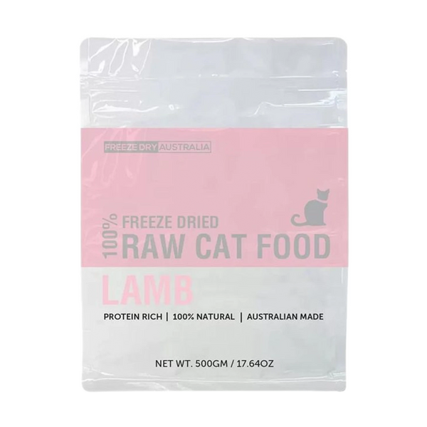 A transparent plastic package of freeze-dried raw cat food labeled LAMB prominently features a cat silhouette and details about its protein-rich, natural ingredients. The package weighs 500g and is marked as Australian made.