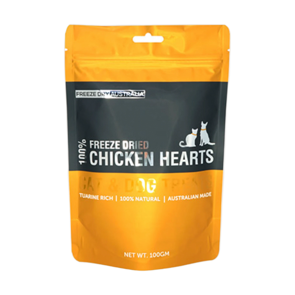 A bright orange and black packaging for freeze-dried chicken hearts, labeled as 100% natural and taurine-rich. The front features illustrations of a cat and dog alongside the product name, with the weight indicated as 100 grams.