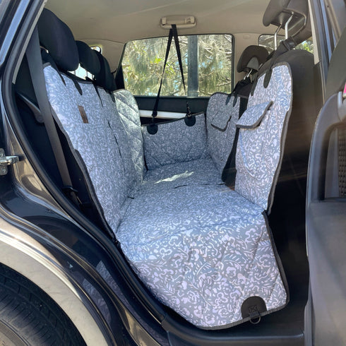 Indie Boho Neutral Brushstrokes Hammock Back Seat Cover installed in a car