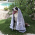 Dog wrapped in an Indie Boho Neutral Brushstrokes towel